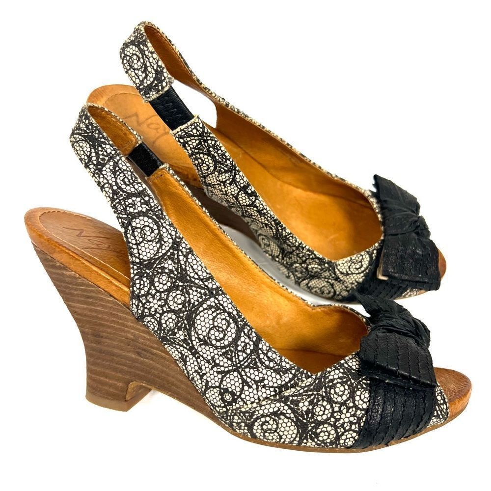 - Naya “ Giada” wedge peep toe heels.  Size 8.5